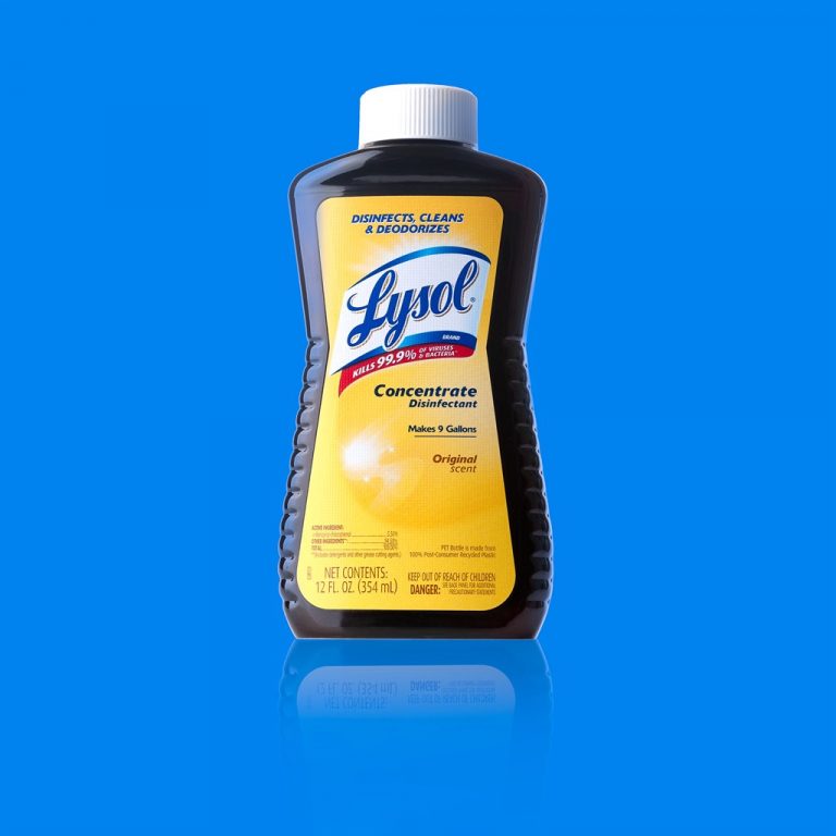 Cleaning product on solid blue - Advertisement